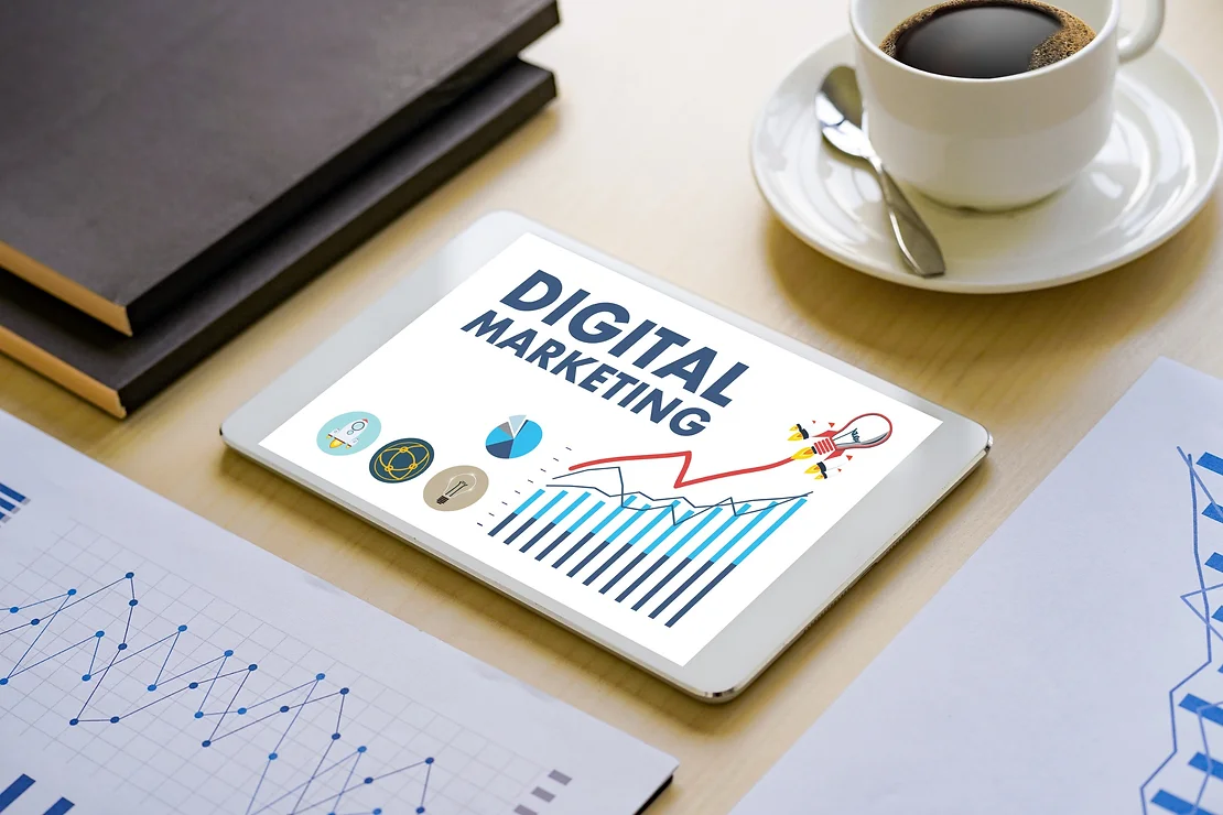 DIGITAL MARKETING new startup project MILLENNIALS Business team hands at work with financial reports and a laptop