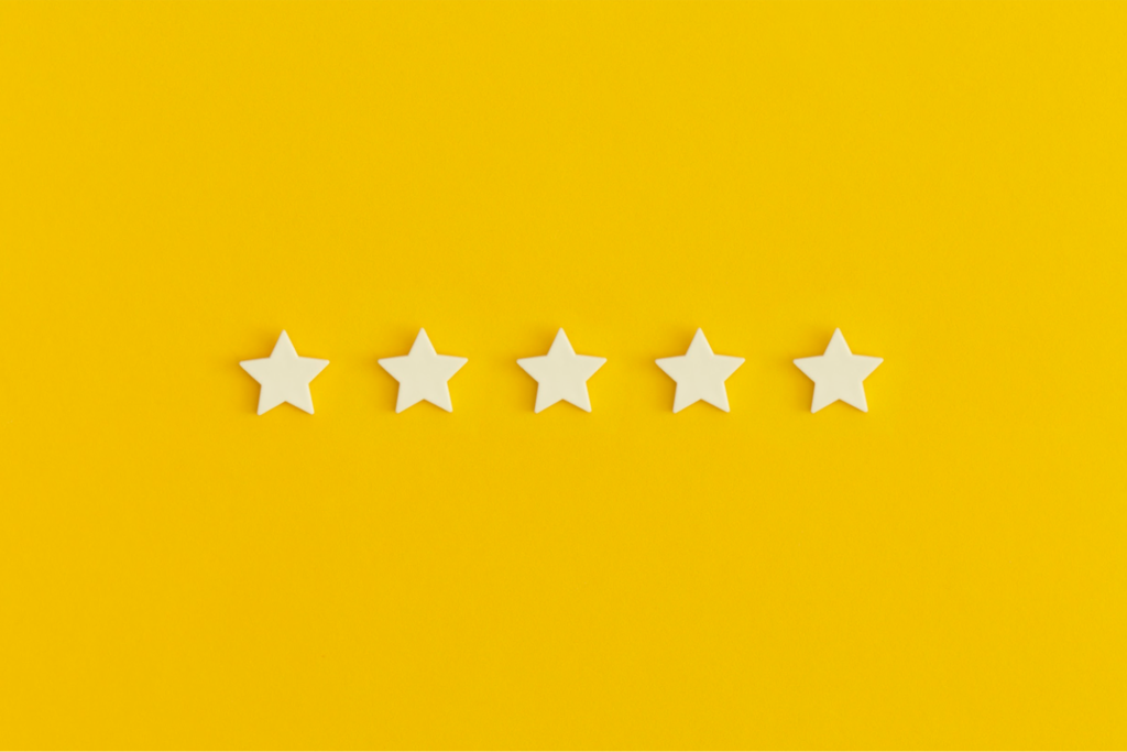 Five stars lined up in a row with a blank background.